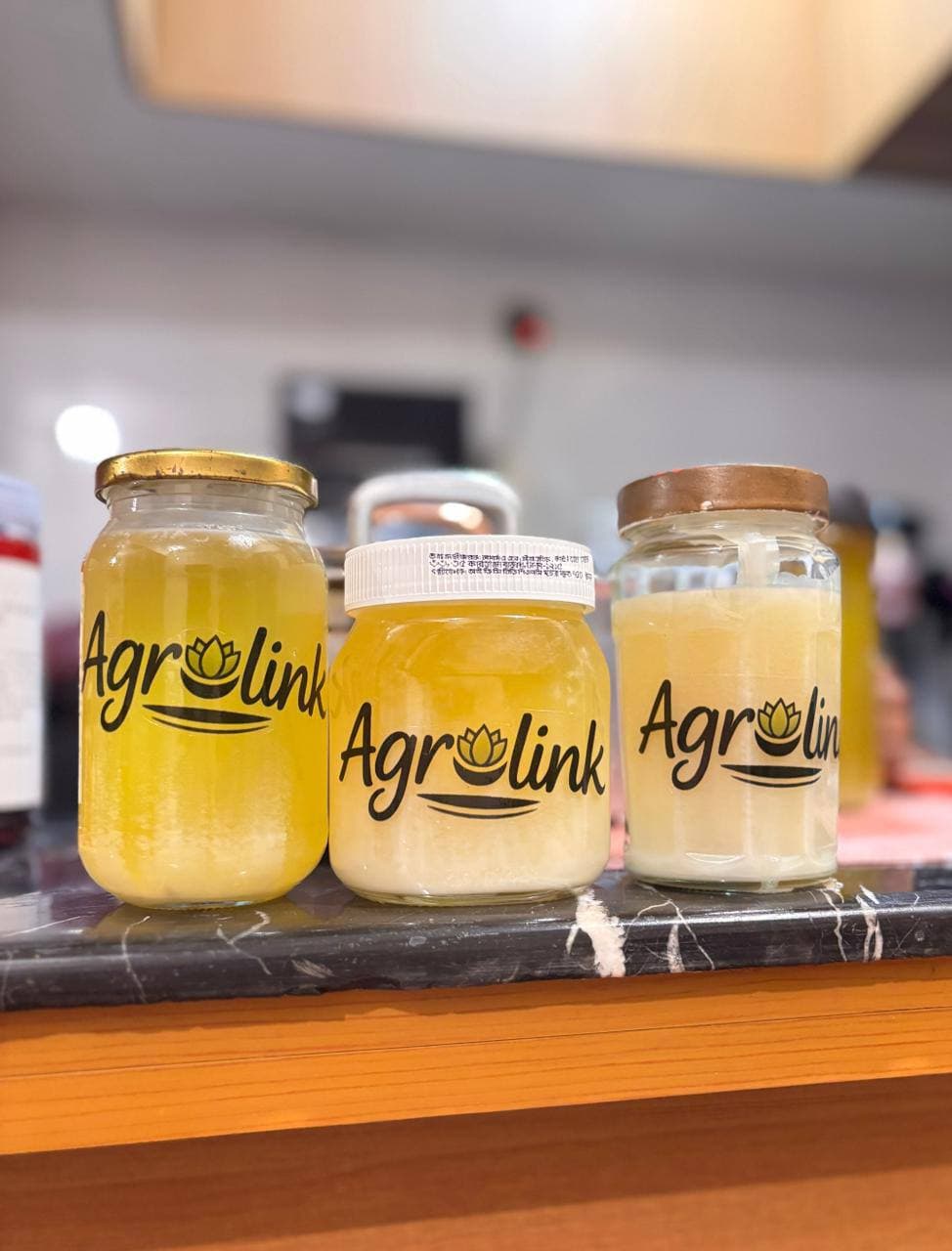 Pure Agrolink cow's milk and ghee in real jars